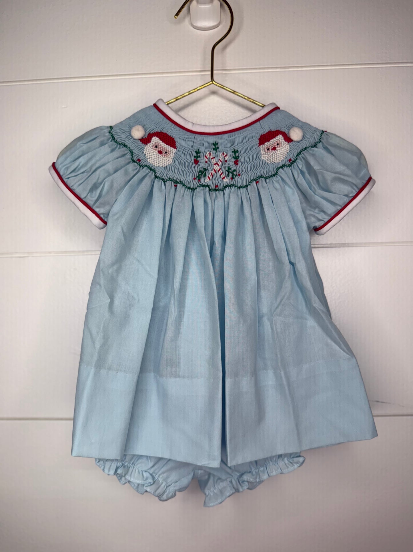 Girl’s Blue Hand Smocked Santa Claus Bishop